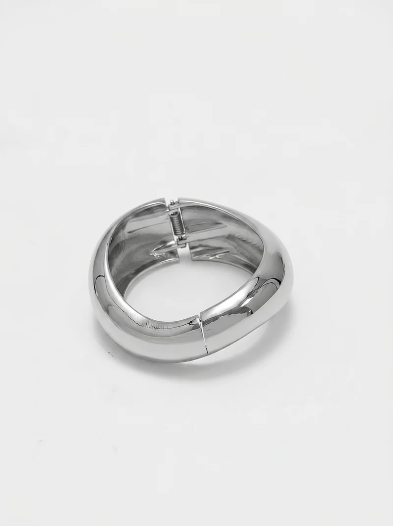 Bracciale rigido bombato a onda - Argento