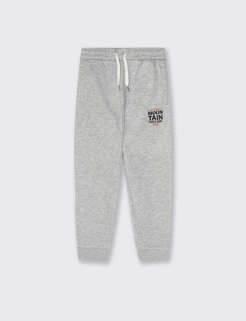 Jogger in felpa con stampa e tasche - Grigio mel.