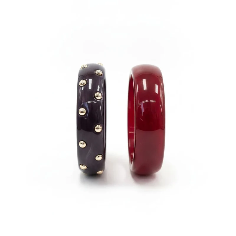 Bracciali rigidi in plastica con borchie - Rosso