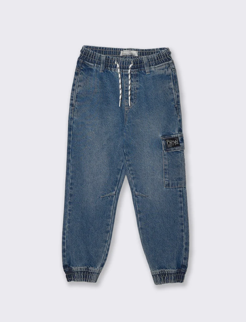 Jogging in denim con tasca laterale - Denim