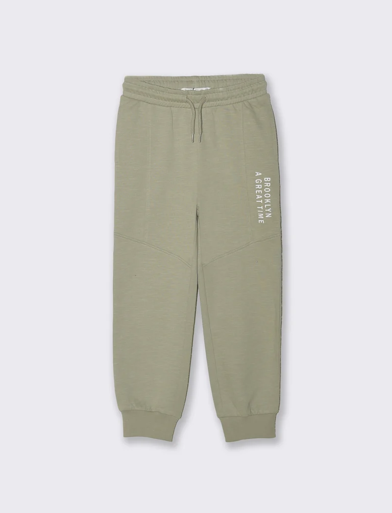 Jogger in felpa fiammata con tagli laterali - Verde