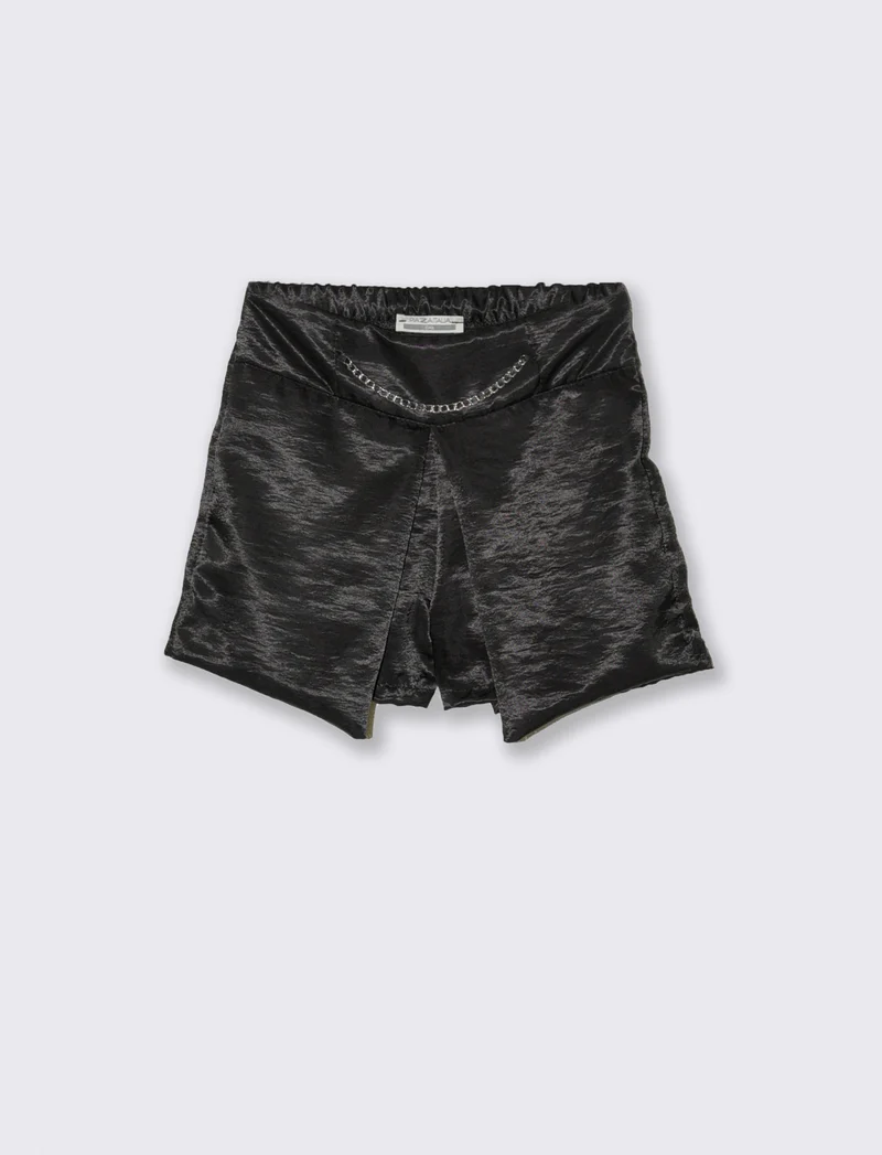 Short elegante in tessuto lucido da bambina. - Nero