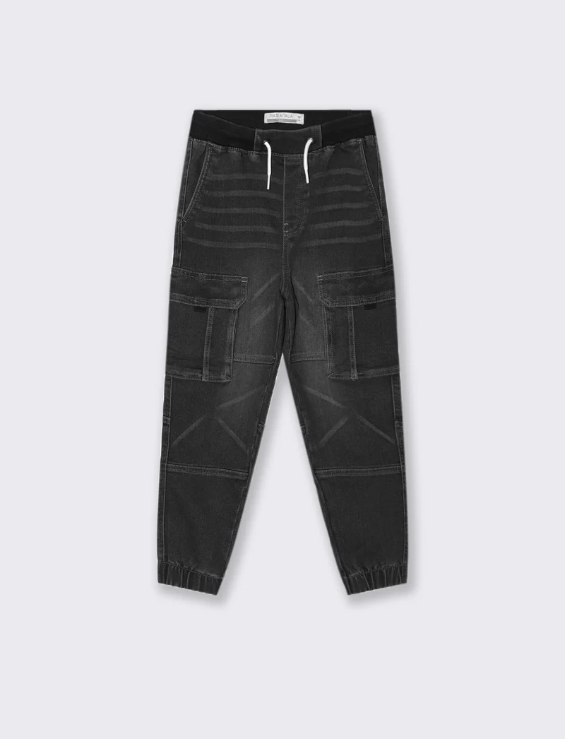 Jogging in denim con tasconi. - Grigio