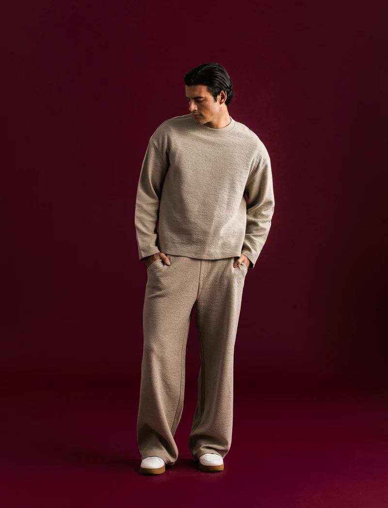 PANTALONI JOGGER IN TESSUTO GOFFRATO - Beige