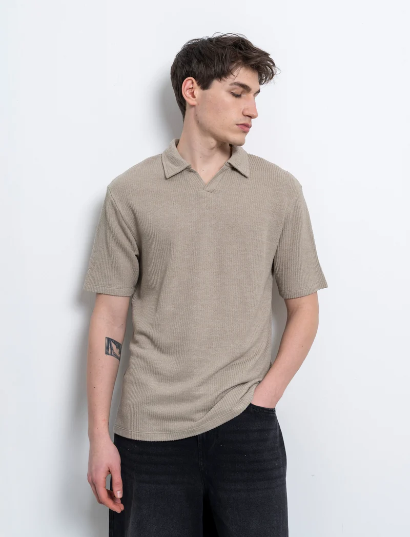Polo con struttura a maglia da uomo - Verde salvia